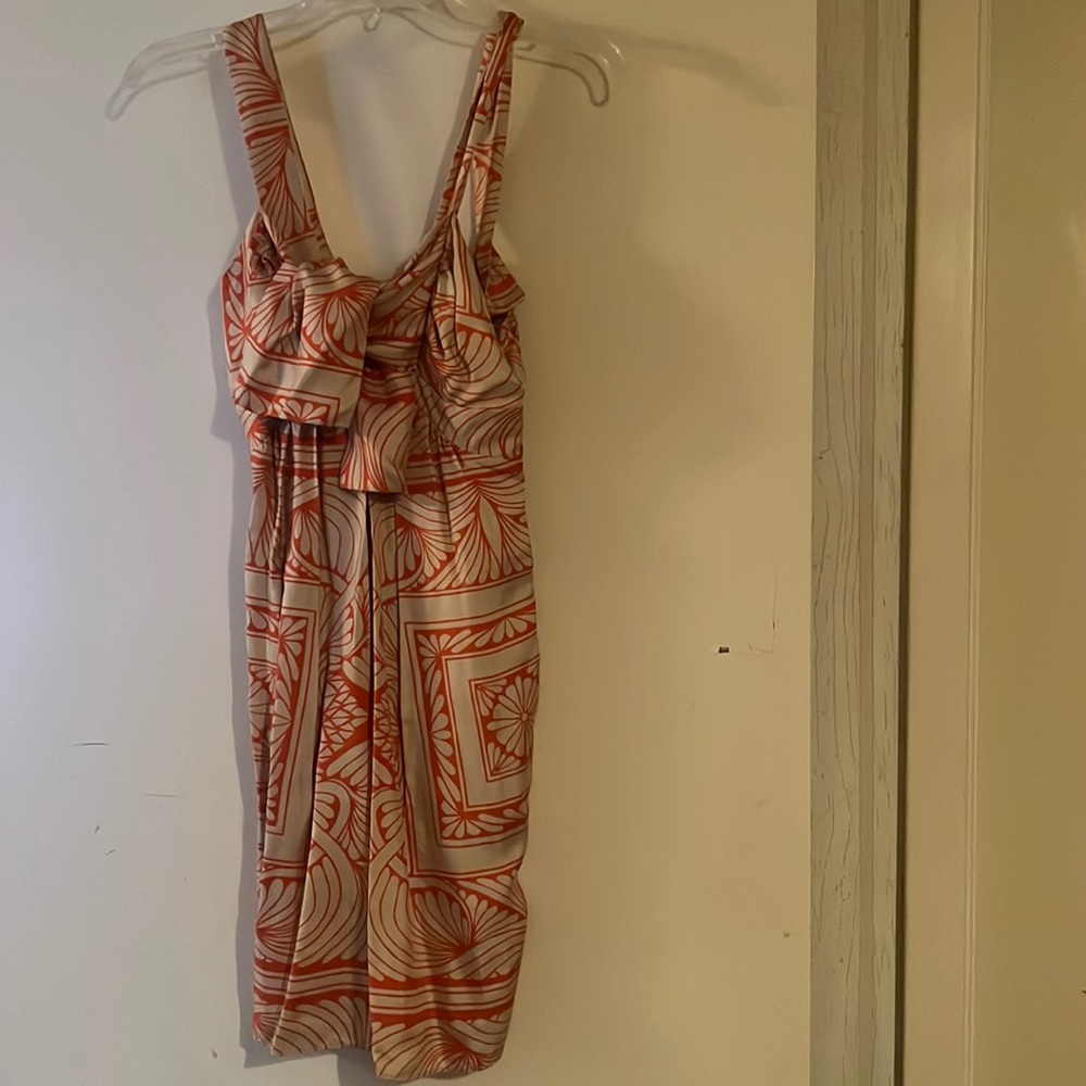 Silk cocktail minidress with tie front and pockets